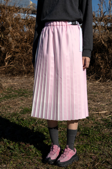 REVEAL PLEATS SKIRT